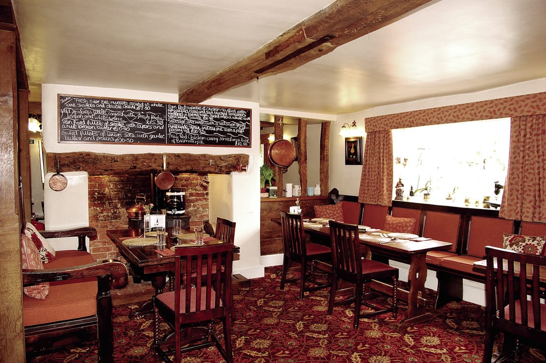 The beamed dining room and the specials blackboard