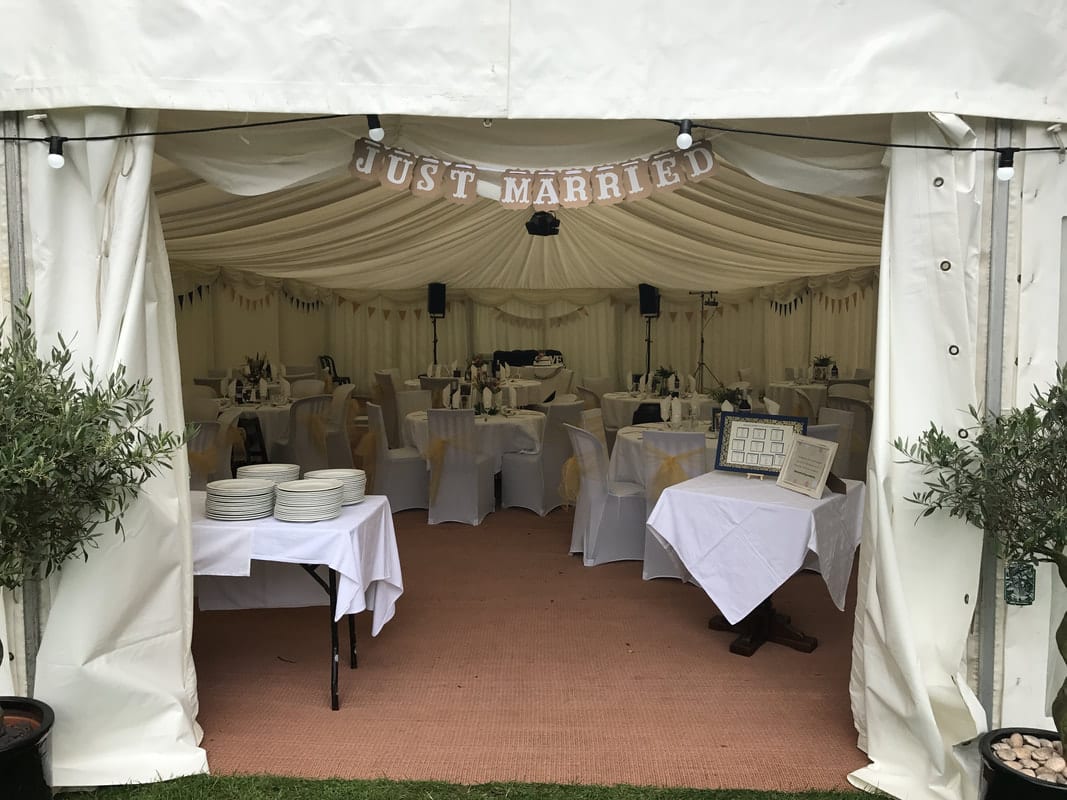 The marquee, dressed for a wedding reception