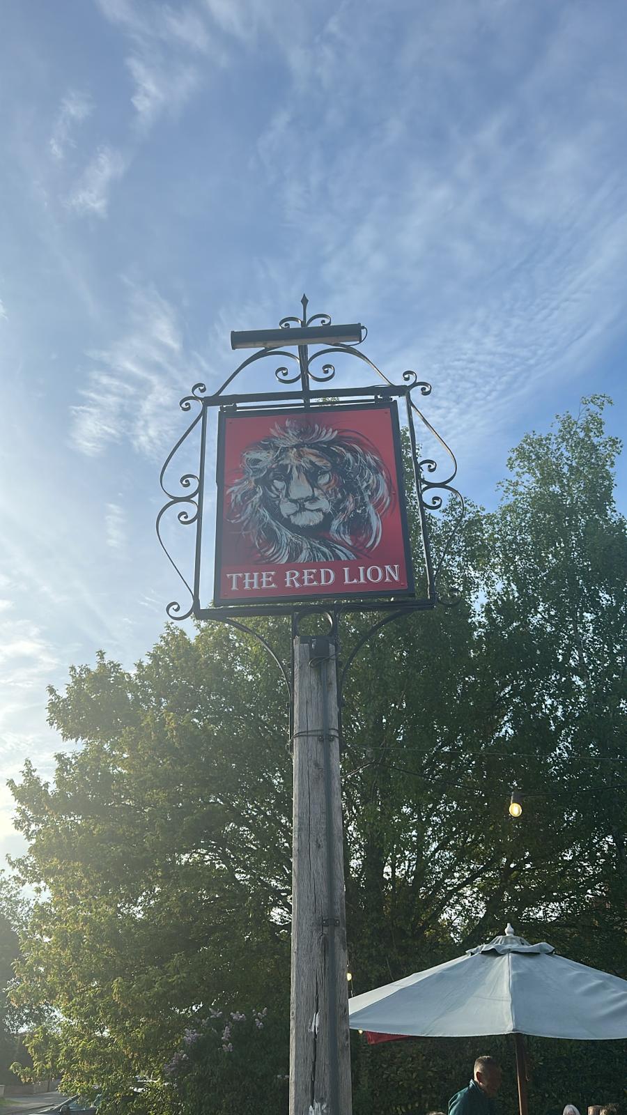 The Red Lion's hand-painted village pub sign